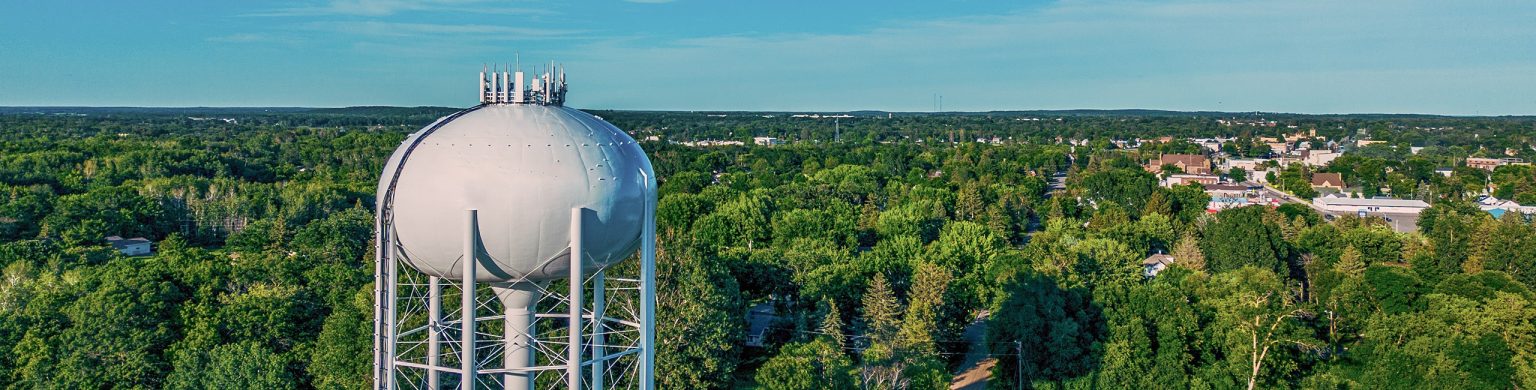 water tower over rural town