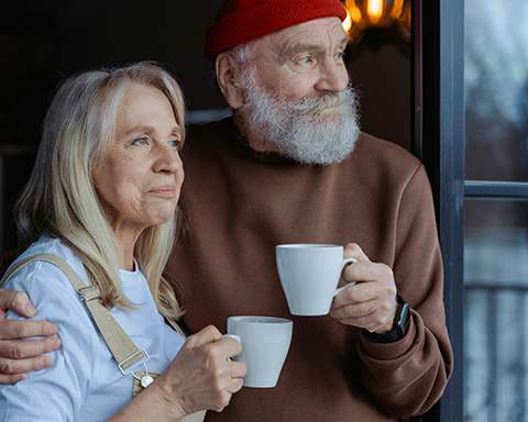 A stock image of an older couple in their home