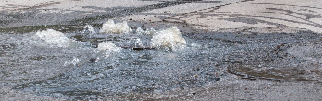 A major water leak in a road
